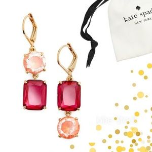 Kate Spade mismatched drop earrings.
